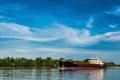 A ship, a barge, a yacht, a boat on the river in the Rostov region. Water transport against the background of a green leafy landsc Royalty Free Stock Photo