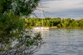 A ship, a barge, a yacht, a boat on the river in the Rostov region. Water transport against the background of a green leafy landsc Royalty Free Stock Photo