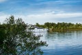 A ship, a barge, a yacht, a boat on the river in the Rostov region. Water transport against the background of a green leafy landsc Royalty Free Stock Photo