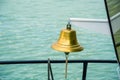 Ship bell with water background Royalty Free Stock Photo