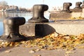 Ship Bollards on Granite Steps with Autumn Leaves.