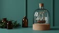 Ship in a Bottle Display with Amber Vials and Greenery Royalty Free Stock Photo