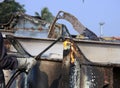 Ship Breaker Gas Cutter demolishing part of INS Vikrant in Darukhana Ship Breaking Yard (close up) Royalty Free Stock Photo