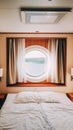 Ship Cabin With Bed And Window With View On Sea. Luxury Cabin On Ferry Boat Or Cruise Liner. Royalty Free Stock Photo