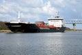 Ship with cargo on the Kiel Canal, Germany.