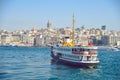 The ship carries passengers along the Bosporus Strait.n