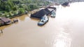 ship carrying coal over the river