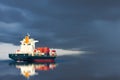 Ship with container import export on storm sky. Royalty Free Stock Photo