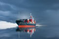 Ship with container import export on storm sky. Royalty Free Stock Photo