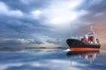 Ship with container on storm sky. Royalty Free Stock Photo