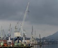 Ship with crane working collecting metal debris from the basque country industry