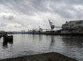 Ship with crane working collecting metal debris from the basque country industry