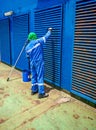 A ship crew is paintinga  funnel on roro ship Royalty Free Stock Photo
