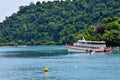 Ship cruise boat tour for send receive thai people and foreign travelers travel visit rest relax and playing swimming water in sea Royalty Free Stock Photo