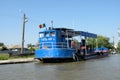 Ship on Danube Delta channel. Royalty Free Stock Photo