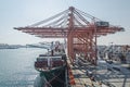 A ship is discharging cargo in the port