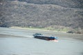 Ship on a European river on a beautiful late autumn day. Royalty Free Stock Photo