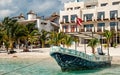 Ship with flag on tropical beach, Costa Maya, Mexico Royalty Free Stock Photo