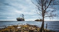 Ship on the foreland with rocks, gunboat island 05 may 2018 Royalty Free Stock Photo