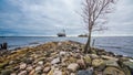 Ship on the foreland with rocks, gunboat island 05 may 2018 Royalty Free Stock Photo