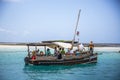 Ship full of people sailing over the water in Wasini Islands, Kenya