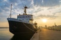 Ship at harbor in Rostock at sunset Royalty Free Stock Photo