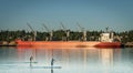 Ship and kayaks along Budd Bay, Puget Sound