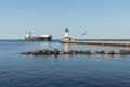 A Ship And A Lighthouse On Lake Superior Royalty Free Stock Photo