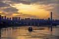 Ship and Lijiatuo Yangtze River Bridge at sunset