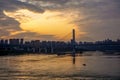 Ship and Lijiatuo Yangtze River Bridge at sunset