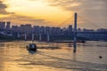 Ship and Lijiatuo Yangtze River Bridge at sunset