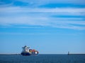 The ship loaded with containers comes out of the port of Gdynia