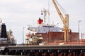 Ship Loading At Large City Wharf