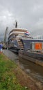 Ship Lonian is passing the Coenecoopbrug sluice with very small space