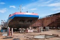 Ship and monumental crane in the shipyard Royalty Free Stock Photo