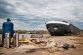 Ship and monumental crane in the shipyard Royalty Free Stock Photo