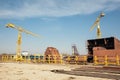 Ship and monumental crane in the shipyard Royalty Free Stock Photo