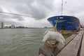 A Ship Moored On The Nieuwe Maas River In Rotterdam, Netherlands