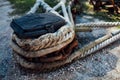 The ship is moored to a dock ladder rope chain Royalty Free Stock Photo