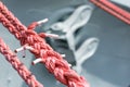 Ship mooring rope on the port wharf. Harbor bollard for large na Royalty Free Stock Photo