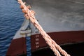 Ship mooring rope on the port wharf. Harbor bollard for large na Royalty Free Stock Photo