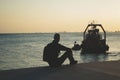 Ship near the coast of istanbul wth person man male looking away at the sea during the sunset