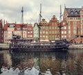 Ship near waterfront in Gdansk cityscape photo