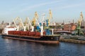 Ship in the port near the quay. Royalty Free Stock Photo