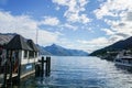 Ship port and water observation office with mountain range backdrop in Queenstown / New Zealand Royalty Free Stock Photo