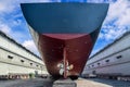 Ship Repair on dry dock yard in shipyard Royalty Free Stock Photo