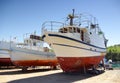 Ship repair on the ground in shipyard or harbor Royalty Free Stock Photo