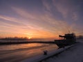 Ship in river in sunrise colors, Lithuania Royalty Free Stock Photo