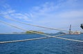 Ship rope against blue water sea texture background Royalty Free Stock Photo