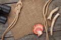 Ship rope with burlap on old wooden texture background Royalty Free Stock Photo